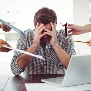 Businessman stressed out at work