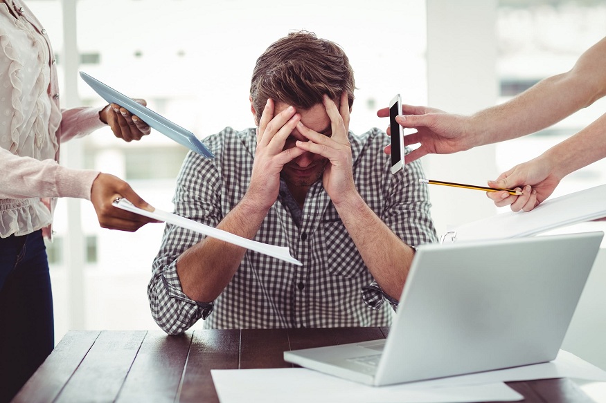 Businessman stressed out at work